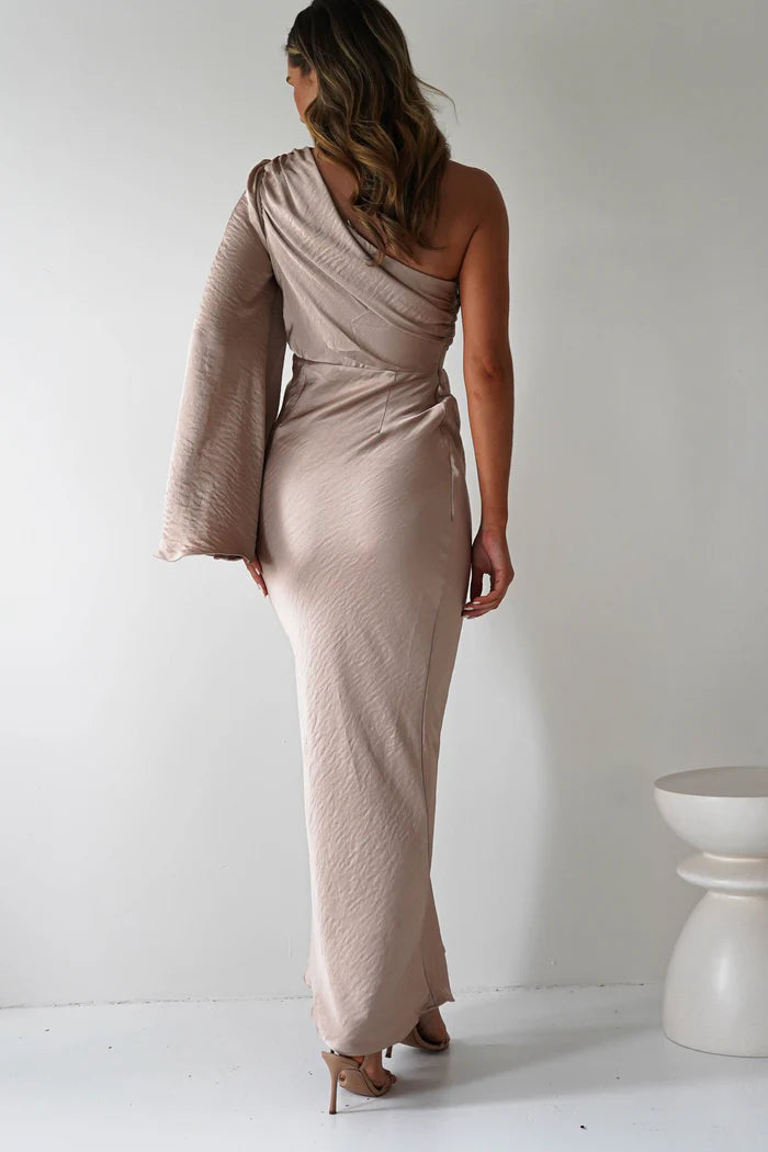 A single long sleeved tight fitting ankle bridesmaid dress suitable for attending weddings