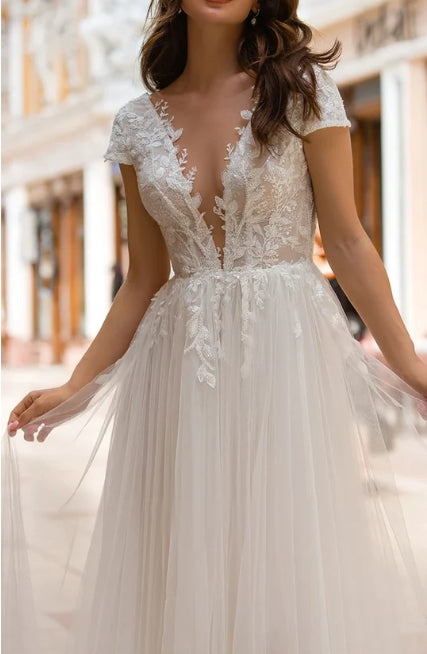A Line Plunging Neckline Tulle Sweep Train Wedding Dress with Appliques