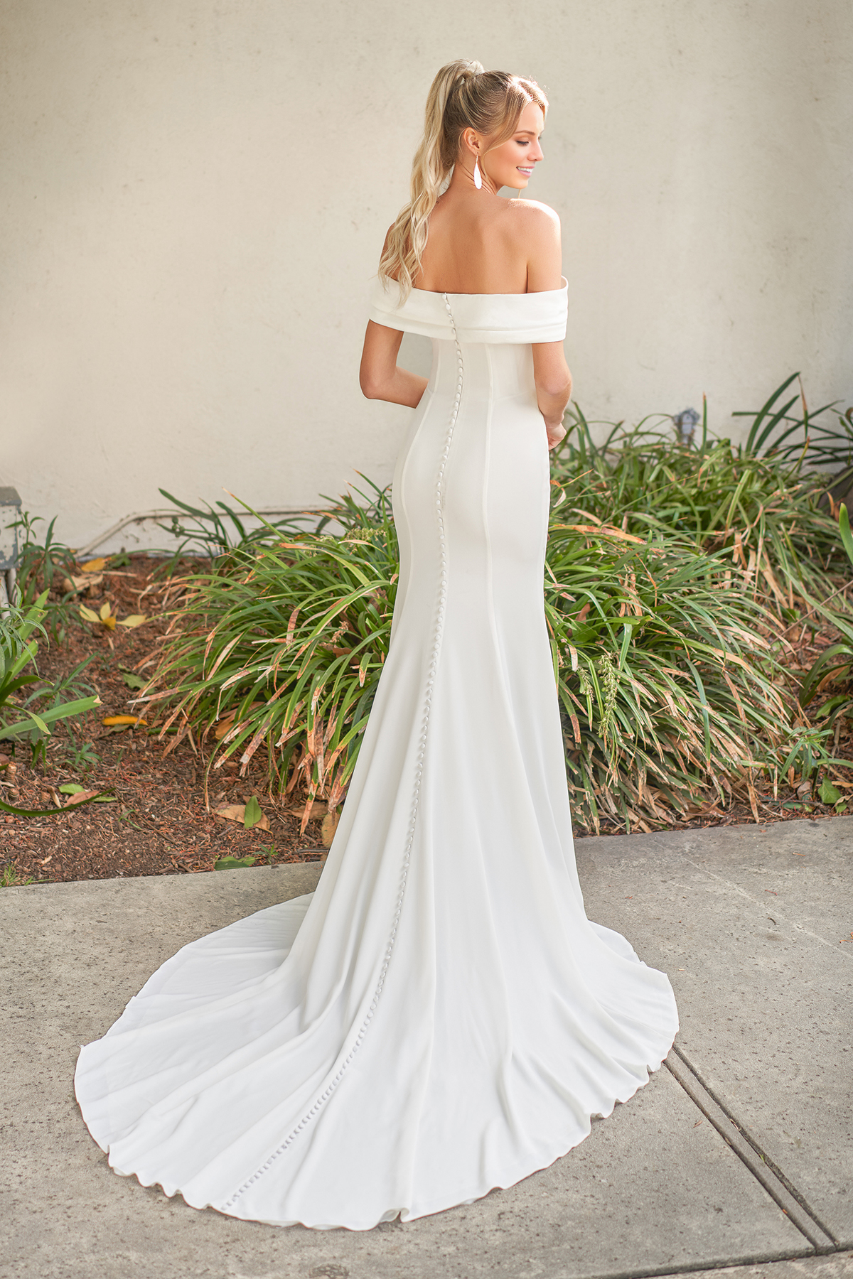 Off shoulder collar sleeveless backless and floor length wedding dress