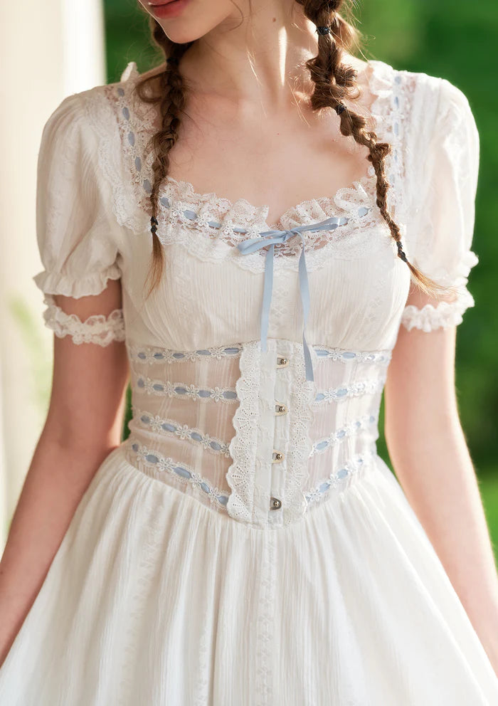 White Cotton Midi Dresses with Square Neck Lace Trim Puff Sleeves Blue Ribbon Accents Lace Corset Waist and Tiered Ruffle Hem