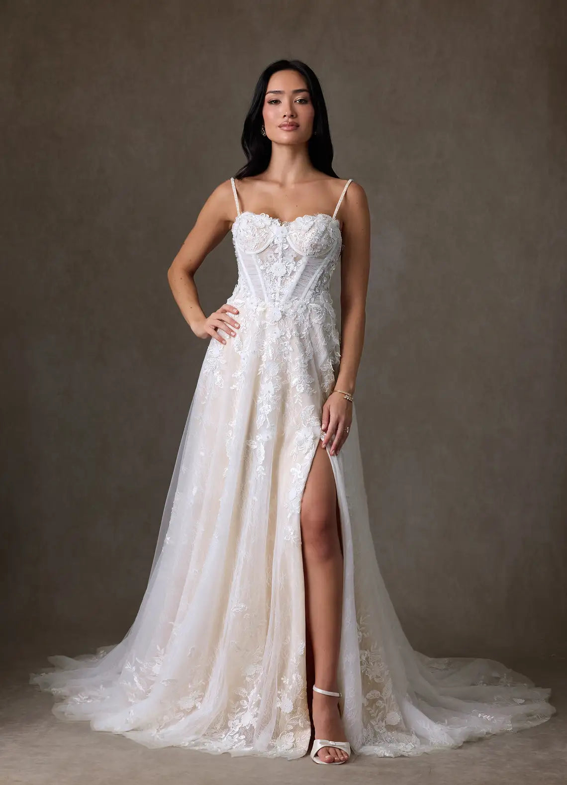A-line skirt with high front slit Spaghetti Strap Lace A-Line Wedding Dress with Corset Bodice and Slit