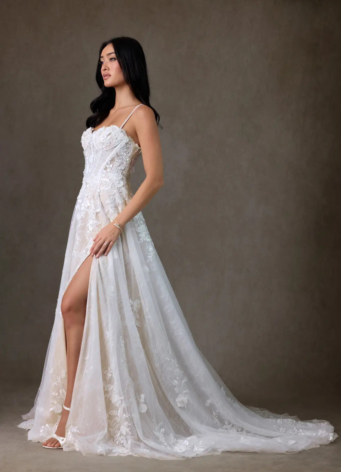A-line skirt with high front slit Spaghetti Strap Lace A-Line Wedding Dress with Corset Bodice and Slit