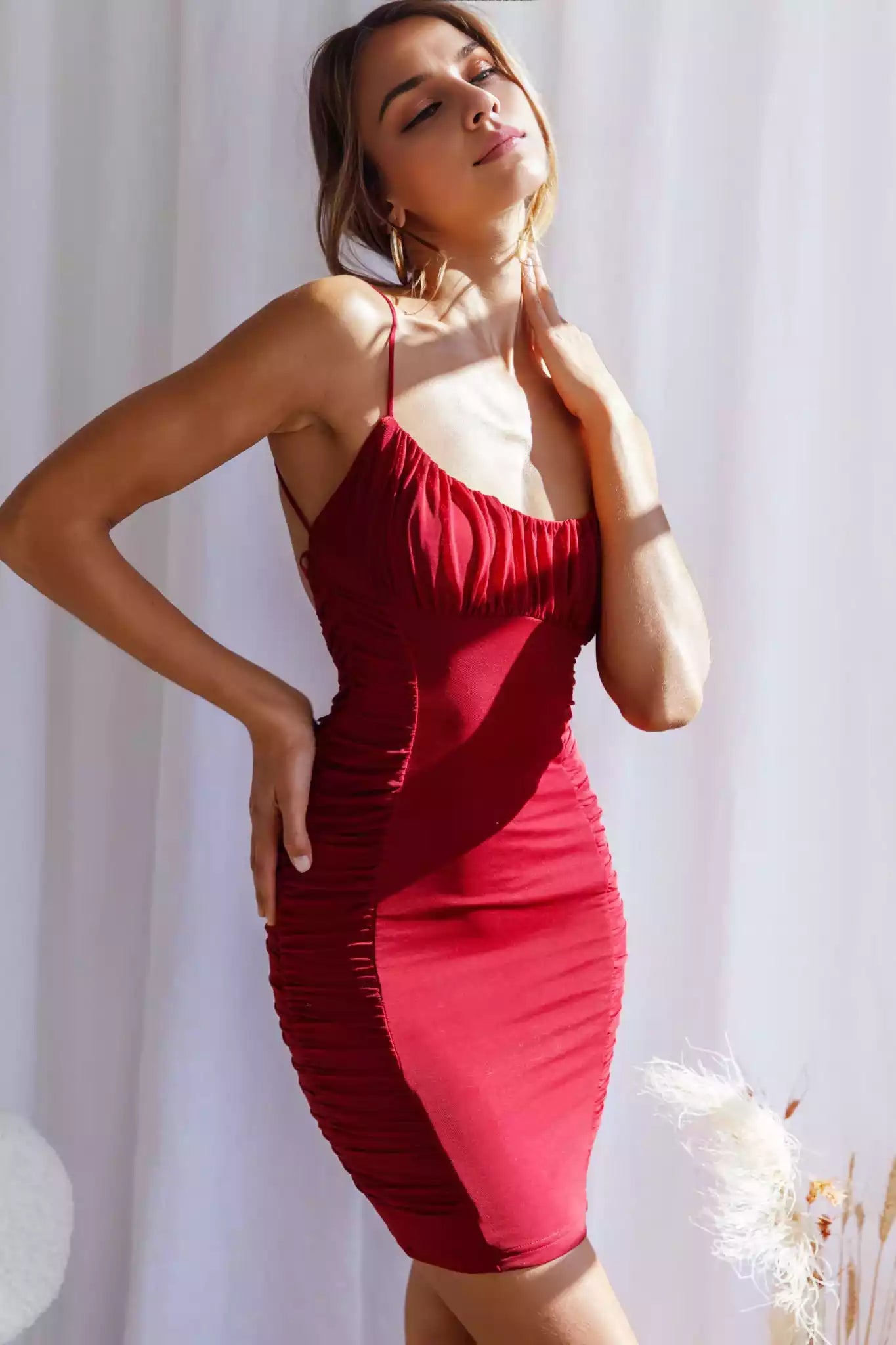 Attention grabbing mini pleated mesh details with adjustable straps and zippered back Homecoming Dresses