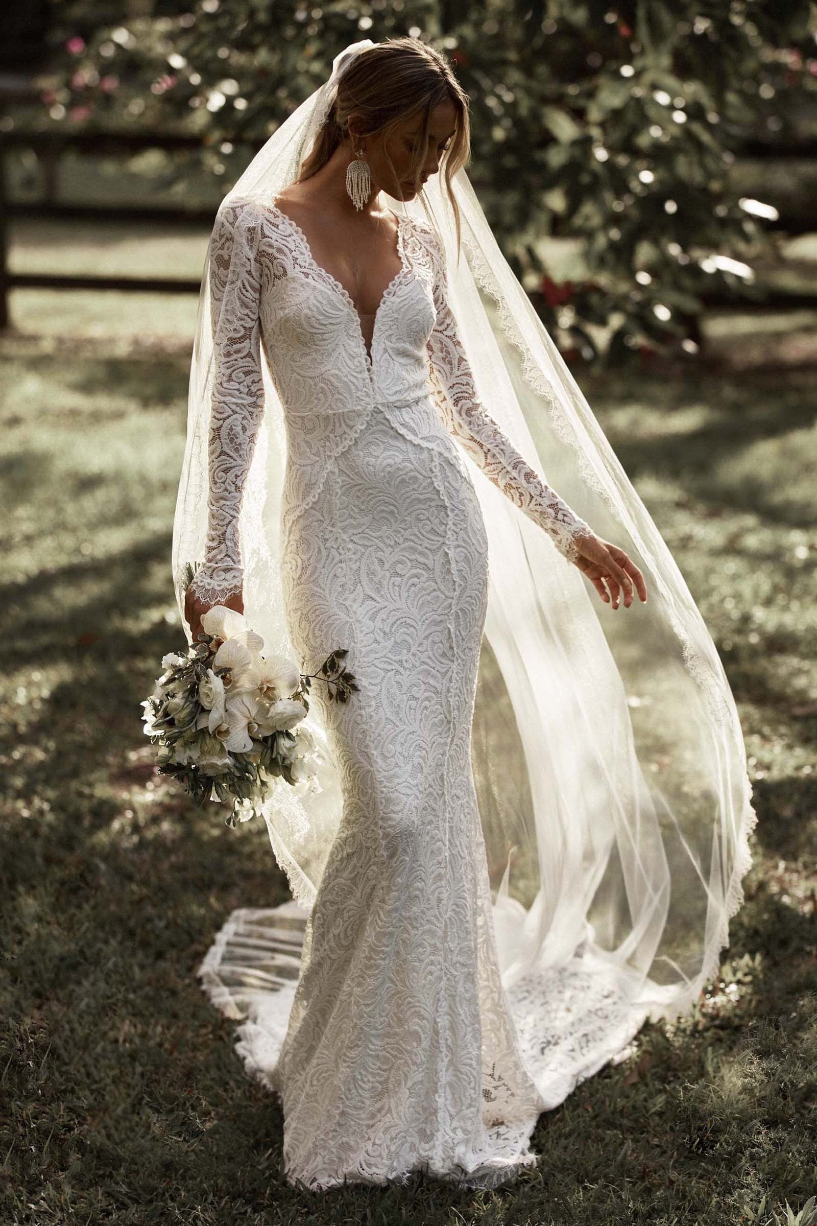 Bohemian Long Sleeve White Lace Mermaid Wedding Dress with Deep V-Back and Scalloped Train
