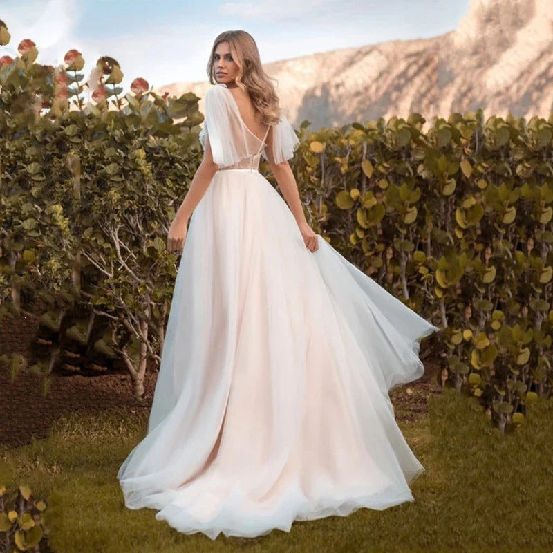 Deep V-Neck Tulle Wedding Dress with Flutter Sleeves and 3D Floral Applique
