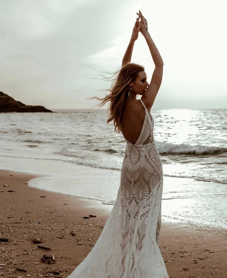 Deep V-neckline with beaded trim and spaghetti straps Bohemian Lace Mermaid Wedding Dress