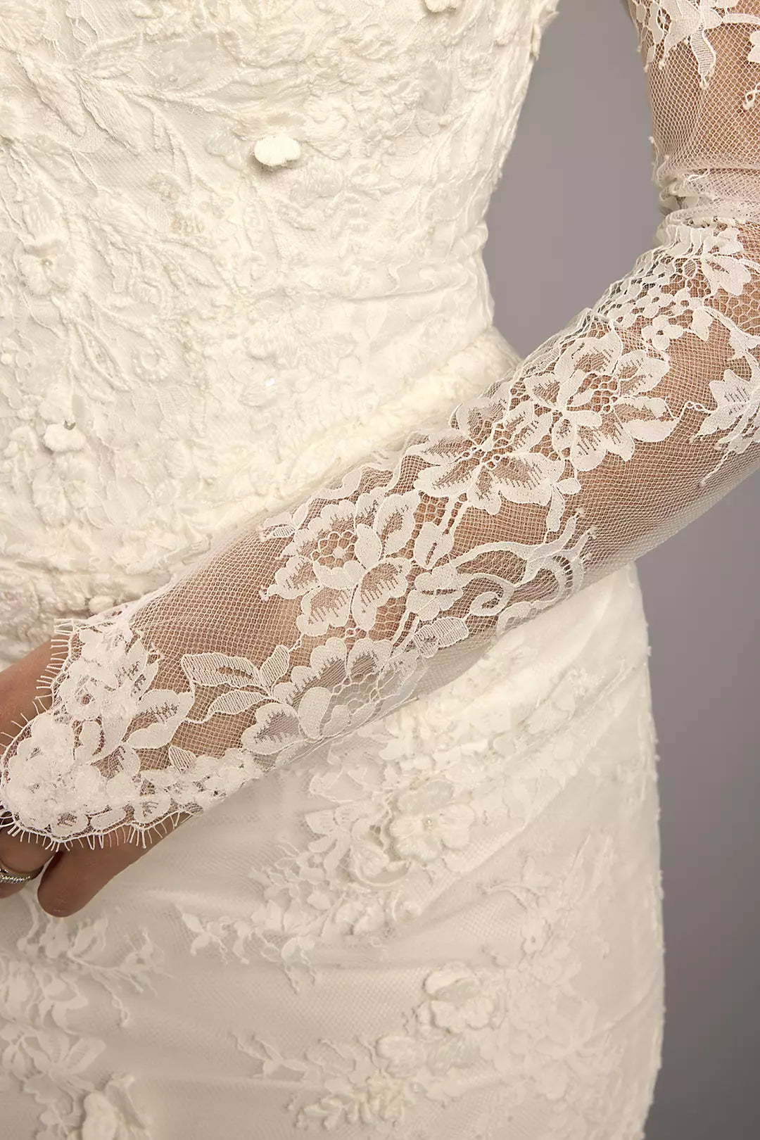 Elegant Strapless Lace Appliqué Mermaid Wedding Dress with Detachable Long Lace Sleeves and Chapel Train