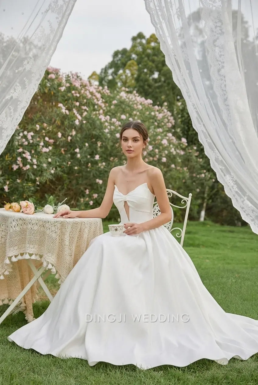 Elegant A-Line Strapless Bow Sleeveless Romantic White Floor-Length Wedding Gown