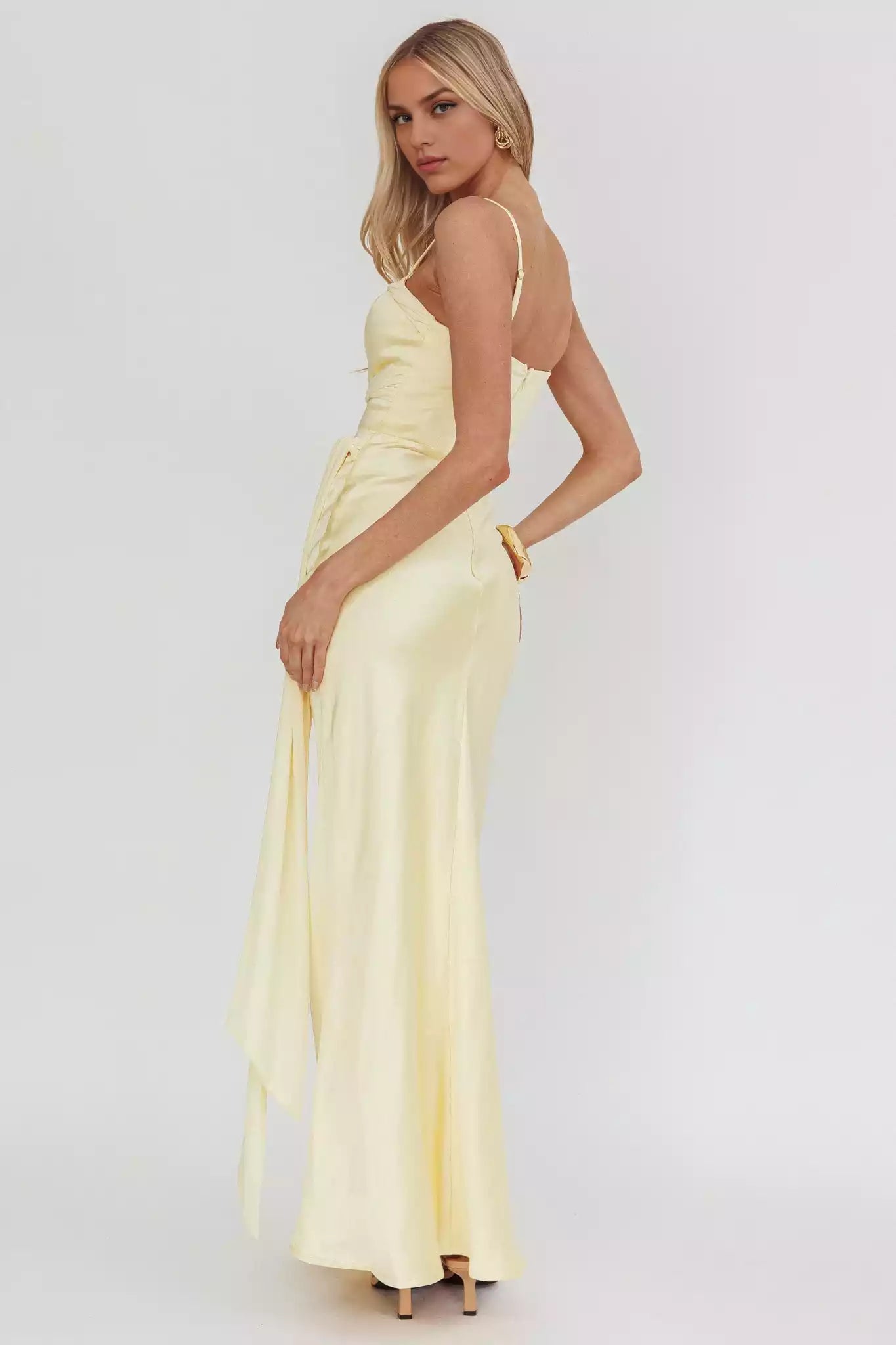 Elegant mesh details with knot embellishments at the waist and lining at the back with zippers Prom Dresses