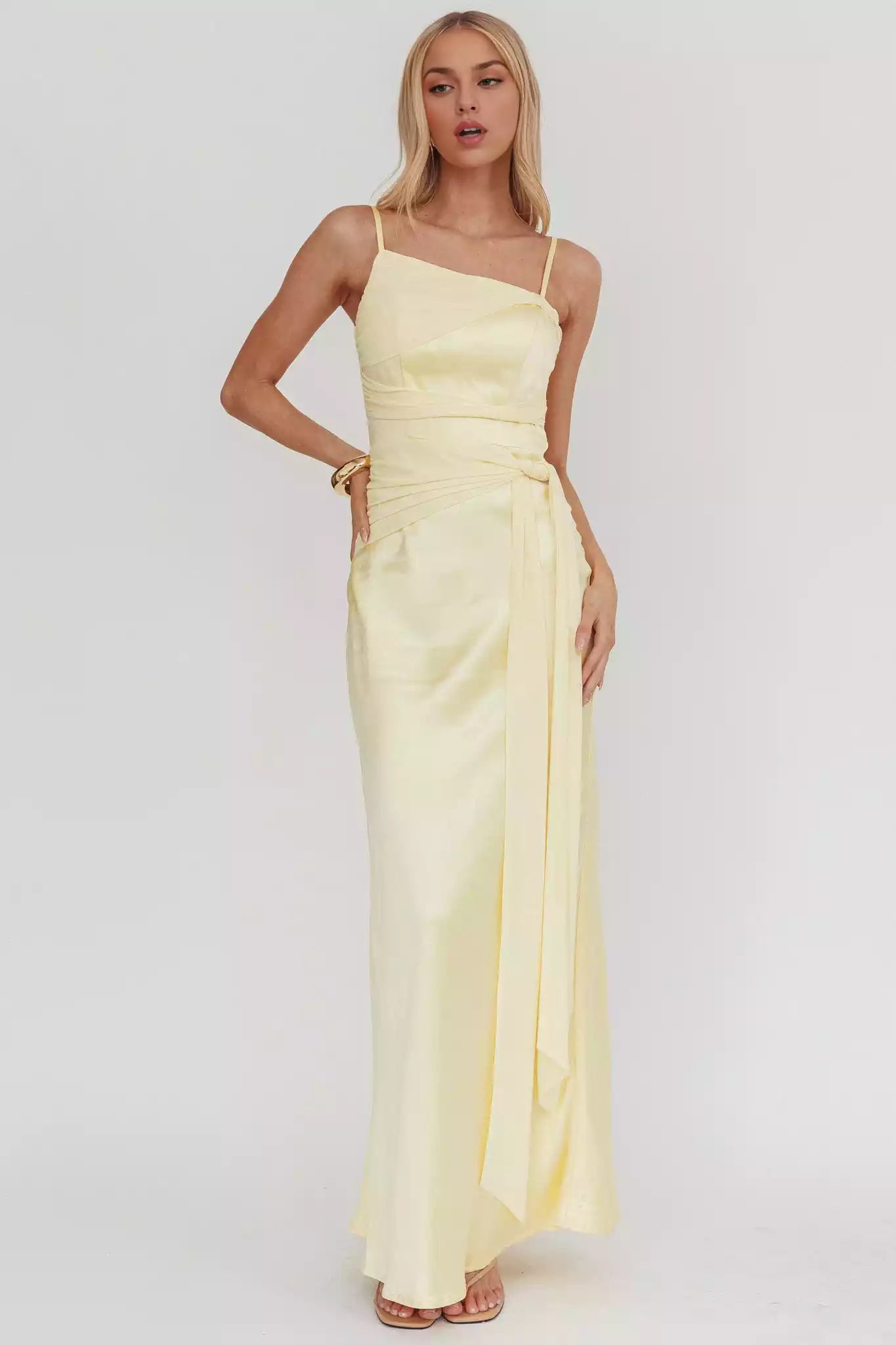 Elegant mesh details with knot embellishments at the waist and lining at the back with zippers Prom Dresses