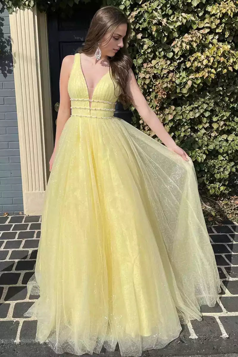 Exquisite and elegant A-line chiffon gently draped deep V-neckline beaded sleeveless cut with exposed back and floor Prom Dresses