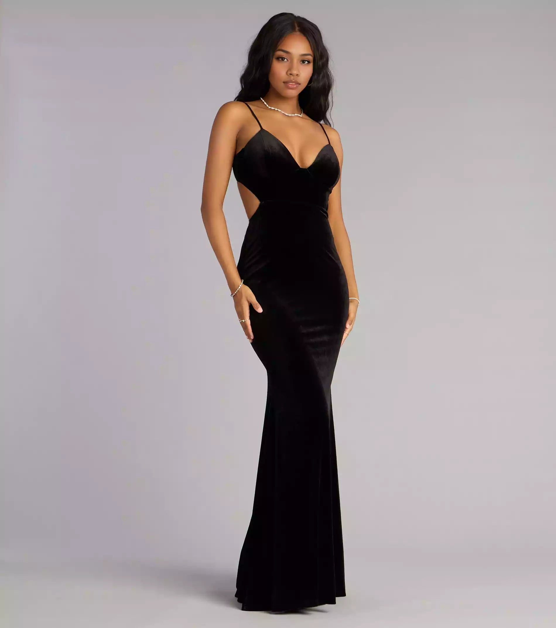 Exquisite luxury velvet V-neck adjustable thin shoulder strap with hollowed out mermaid silhouette and Prom Dresses on the ground