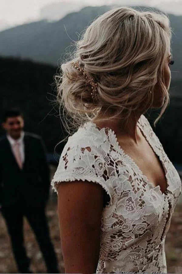 Fitted mermaid silhouette with subtle train Cap Sleeve Lace Mermaid Wedding Dress with Plunge Back