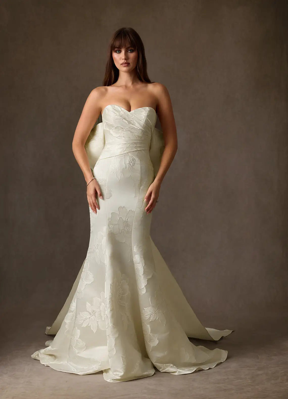 Fitted mermaid silhouette with train Floral Jacquard Mermaid Wedding Dress with Oversized Bow Back