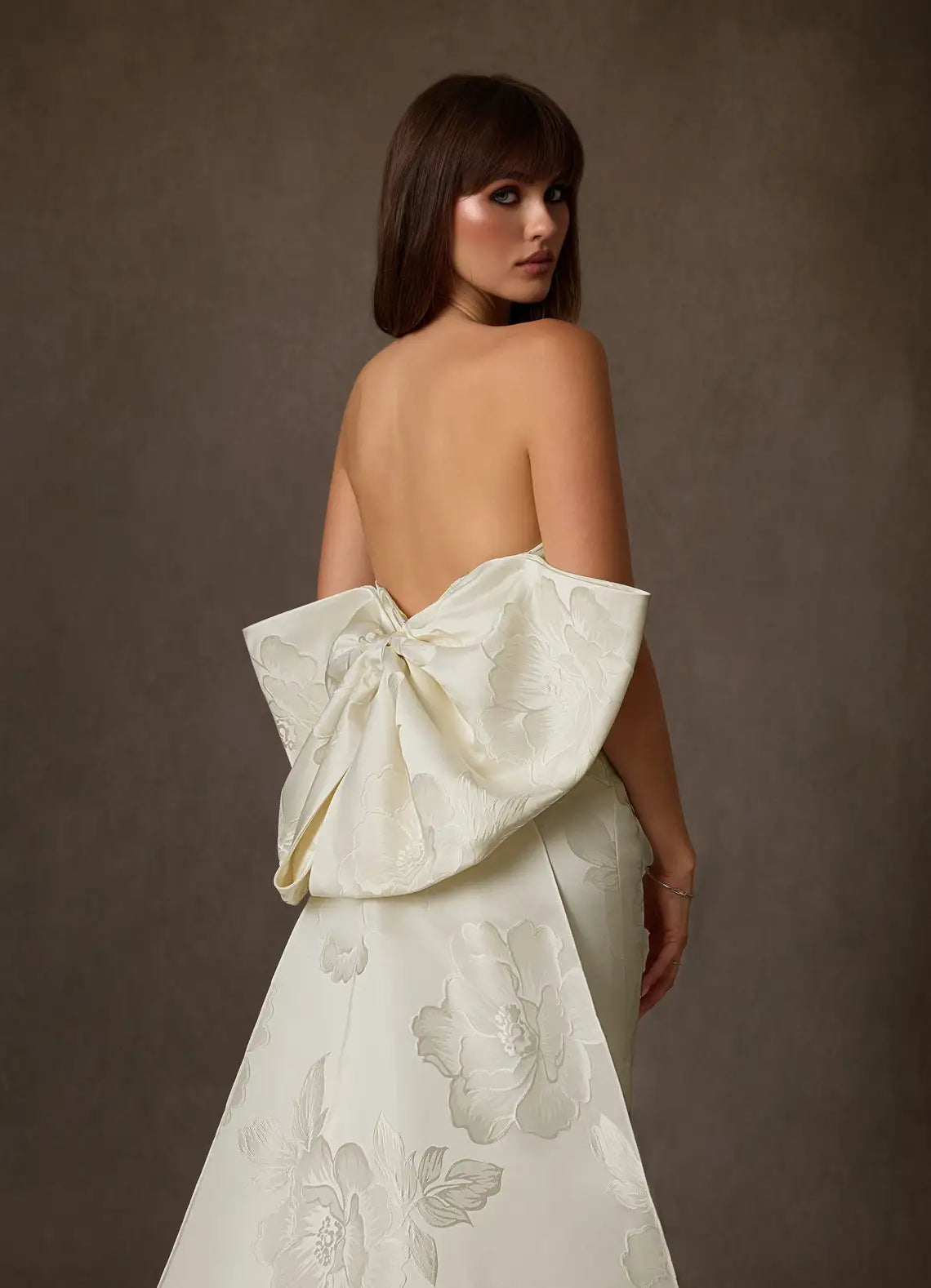 Fitted mermaid silhouette with train Floral Jacquard Mermaid Wedding Dress with Oversized Bow Back