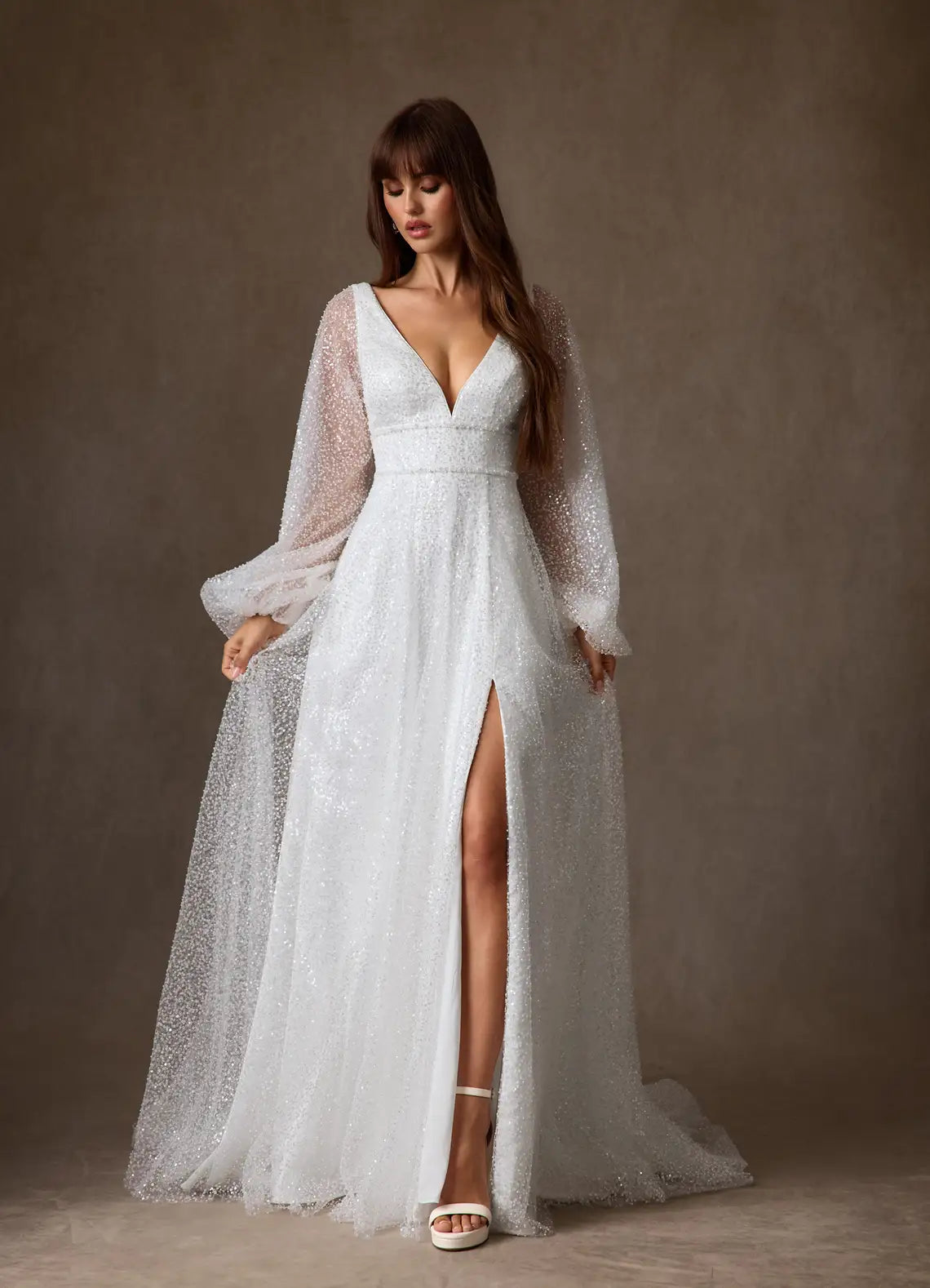 Flowy A-line skirt with front slit and train Sparkly Tulle A-Line Wedding Dress with Puff Sleeves and Slit