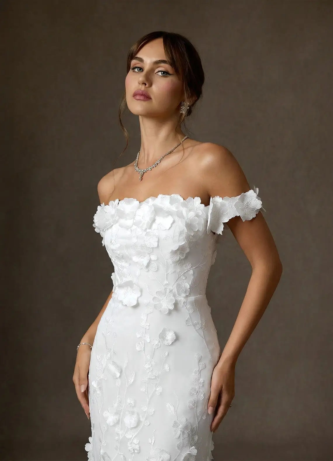 Form-fitting mermaid silhouette with subtle train Off-the-Shoulder 3D Floral Lace Mermaid Wedding Dress