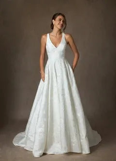 Full A-line skirt with subtle train Floral Jacquard A-Line Wedding Dress with Bow Back