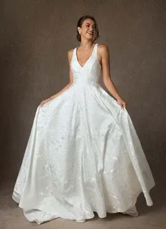 Full A-line skirt with subtle train Floral Jacquard A-Line Wedding Dress with Bow Back