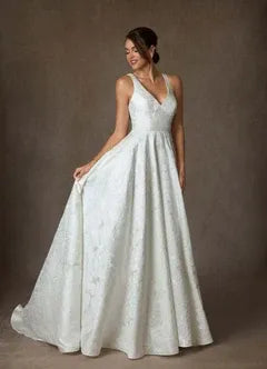 Full A-line skirt with subtle train Floral Jacquard A-Line Wedding Dress with Bow Back