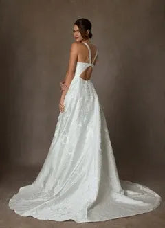 Full A-line skirt with subtle train Floral Jacquard A-Line Wedding Dress with Bow Back