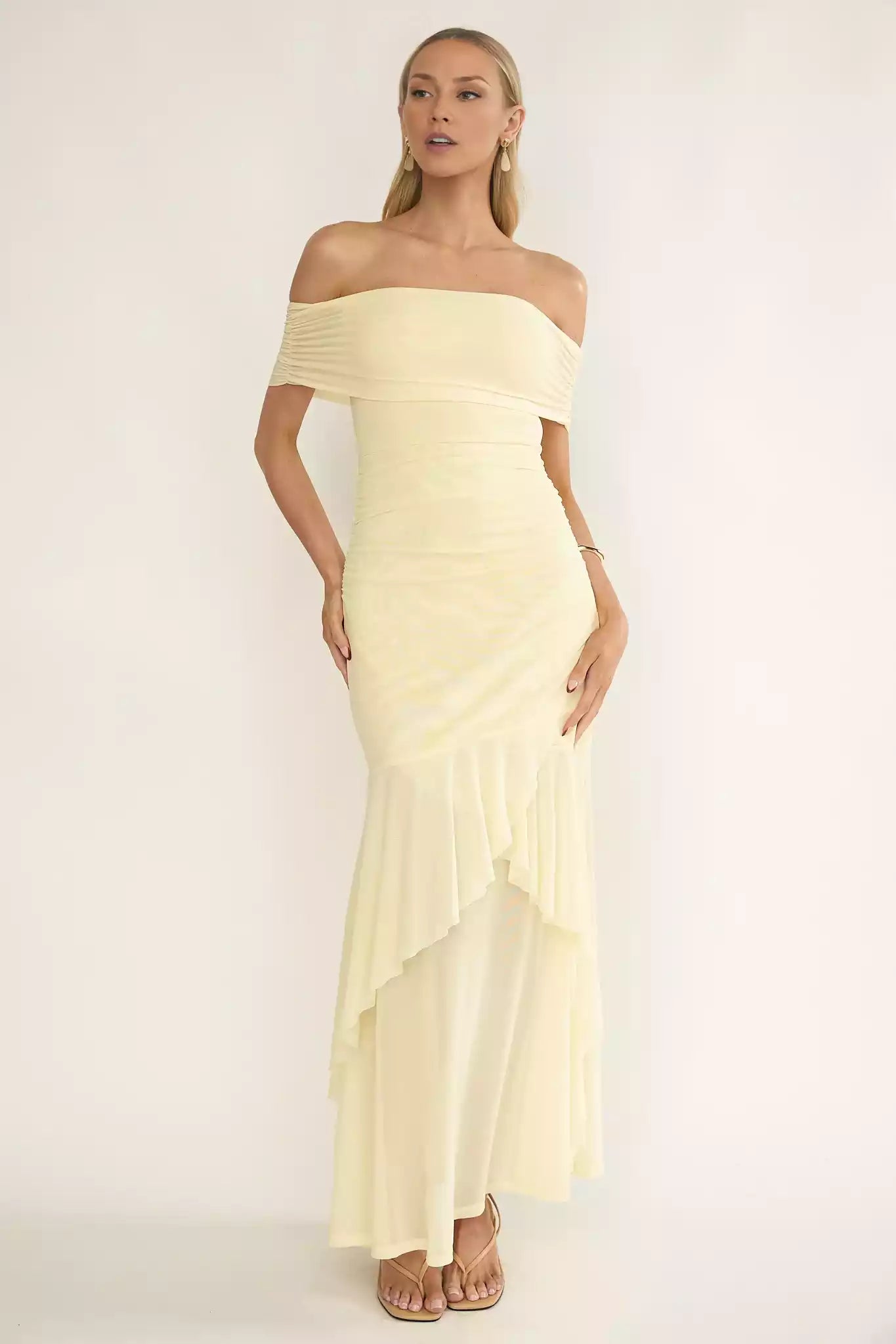 Gorgeous close fitting silhouette with off shoulder pleat details and zippered side Prom Dresses