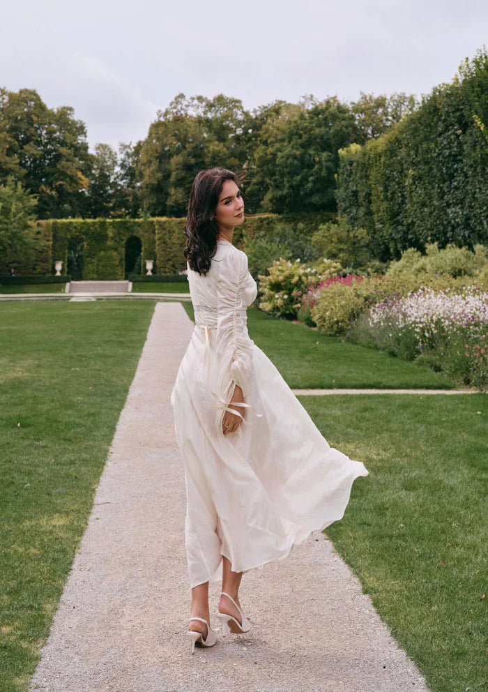 Ivory Textured Midi Dresses with V Neck Lace Trim Puff Long Sleeves Lace Waist Detail and Flowy Skirt