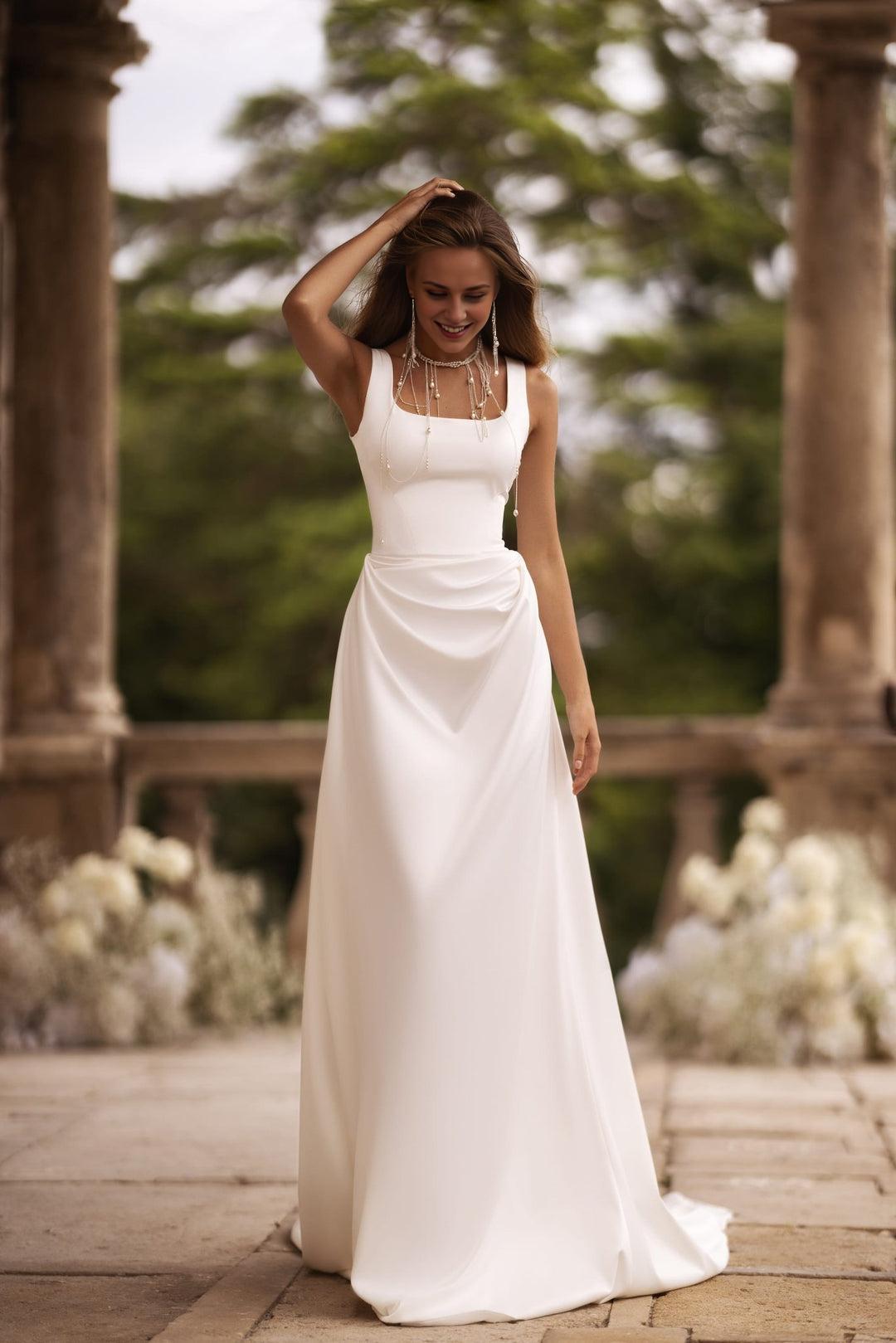 Elegant Ivory Satin Wedding Dress with Square Neck Accentuated Waist and Extended Train