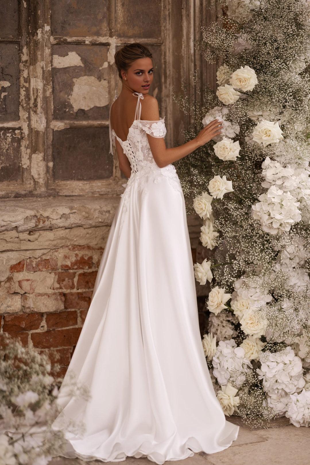 Enchanting Ivory A-Line Wedding Dress with Floral Corset and Delicate Shoulder Bows