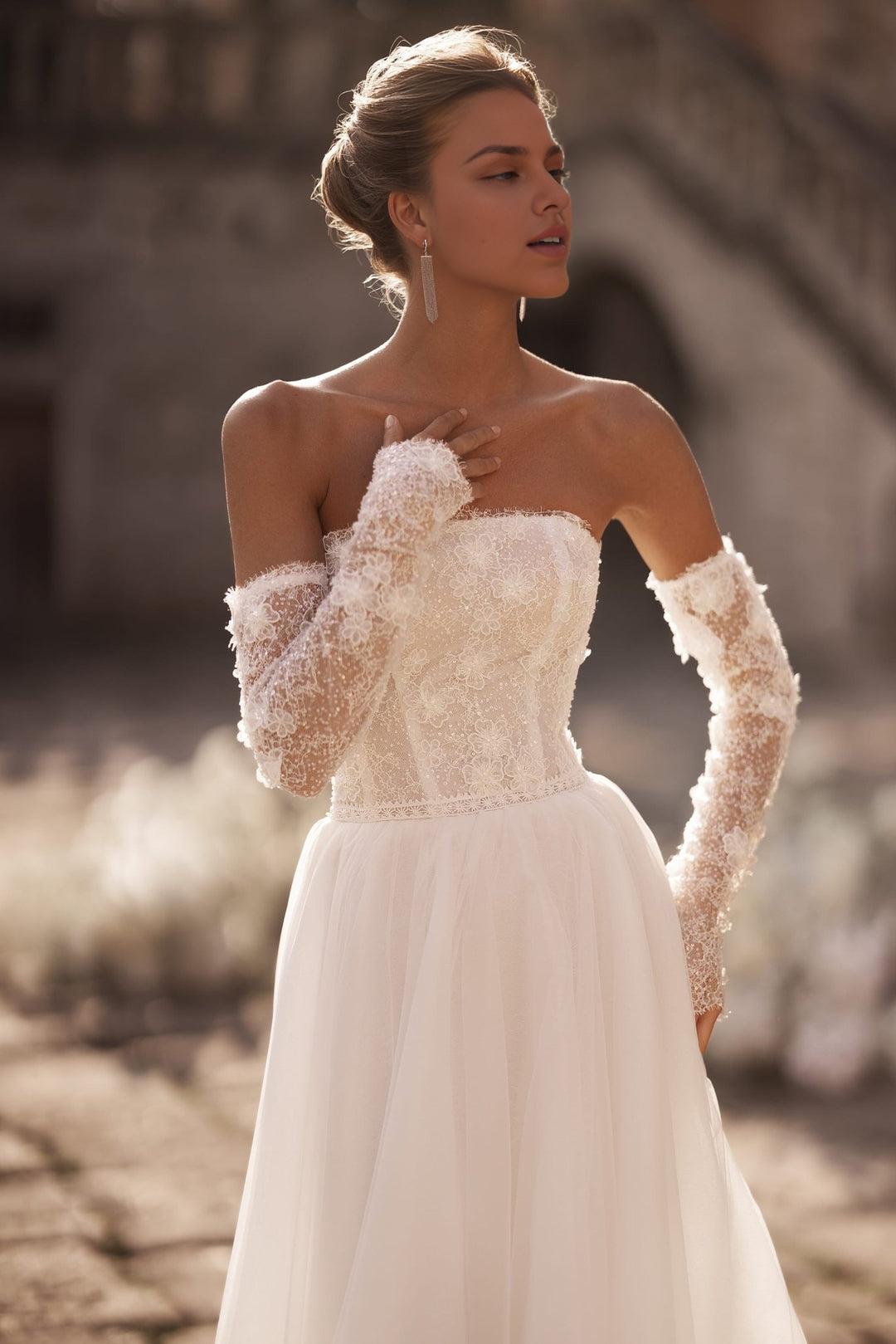 Ivory A-Line Bridal Gown with Embellished Corset and Seamless Skirt Flow