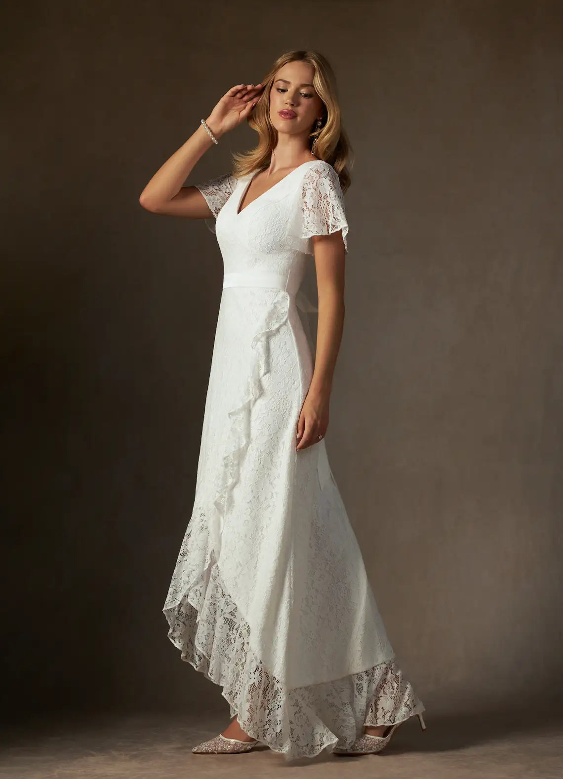 Luxurious floral lace construction V-Neck Lace High-Low Wedding Dress with Flutter Sleeves & Ruffle Hem