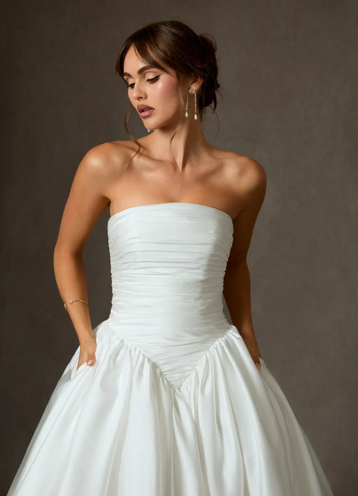 Luxurious smooth satin construction Strapless Ruched Bodice Satin Ball Gown Wedding Dress with Pockets