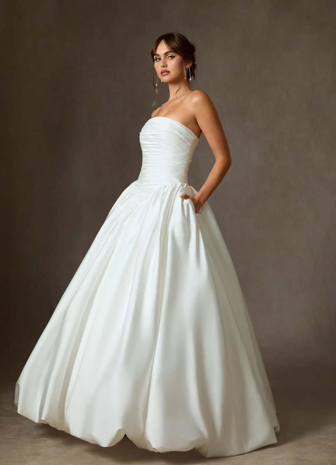 Luxurious smooth satin construction Strapless Ruched Bodice Satin Ball Gown Wedding Dress with Pockets