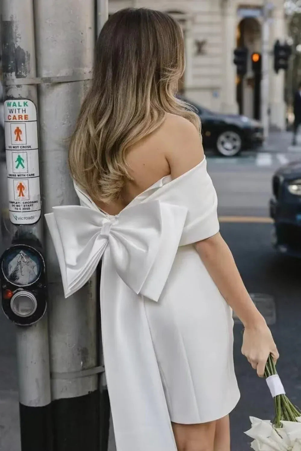 Off-the-Shoulder Satin Mini Wedding Dress with Back Bow - Modern Bridal & Elopement GownOff-the-Shoulder Satin Mini Wedding Dress with Back Bow - Modern Bridal & Elopement Gown