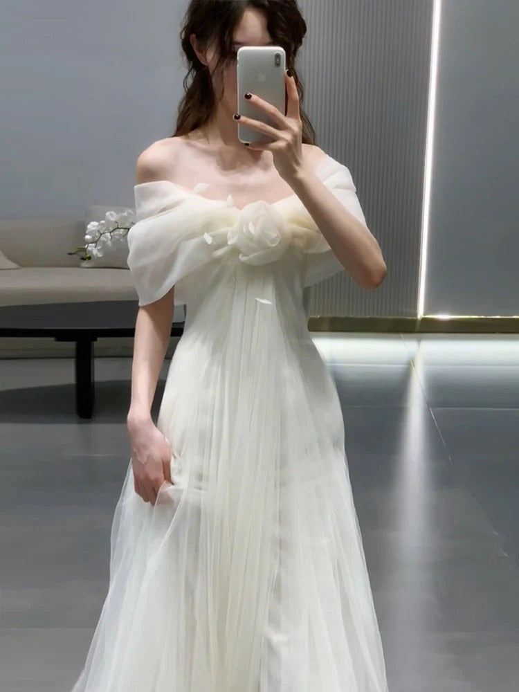 Off-the-Shoulder Tulle Wedding Dress with Floral Bow Detail and Sweep Train