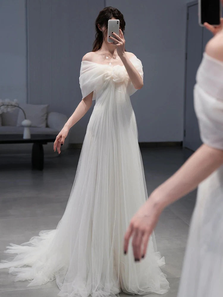 Off-the-Shoulder Tulle Wedding Dress with Floral Bow Detail and Sweep Train