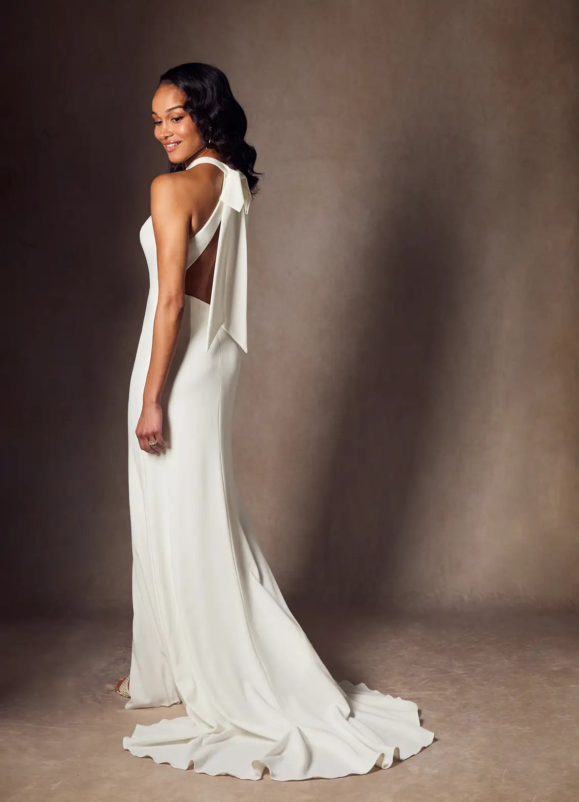 Open back with statement bow detail Minimalist Halter Neck Crepe Mermaid Wedding Dress with Bow Back