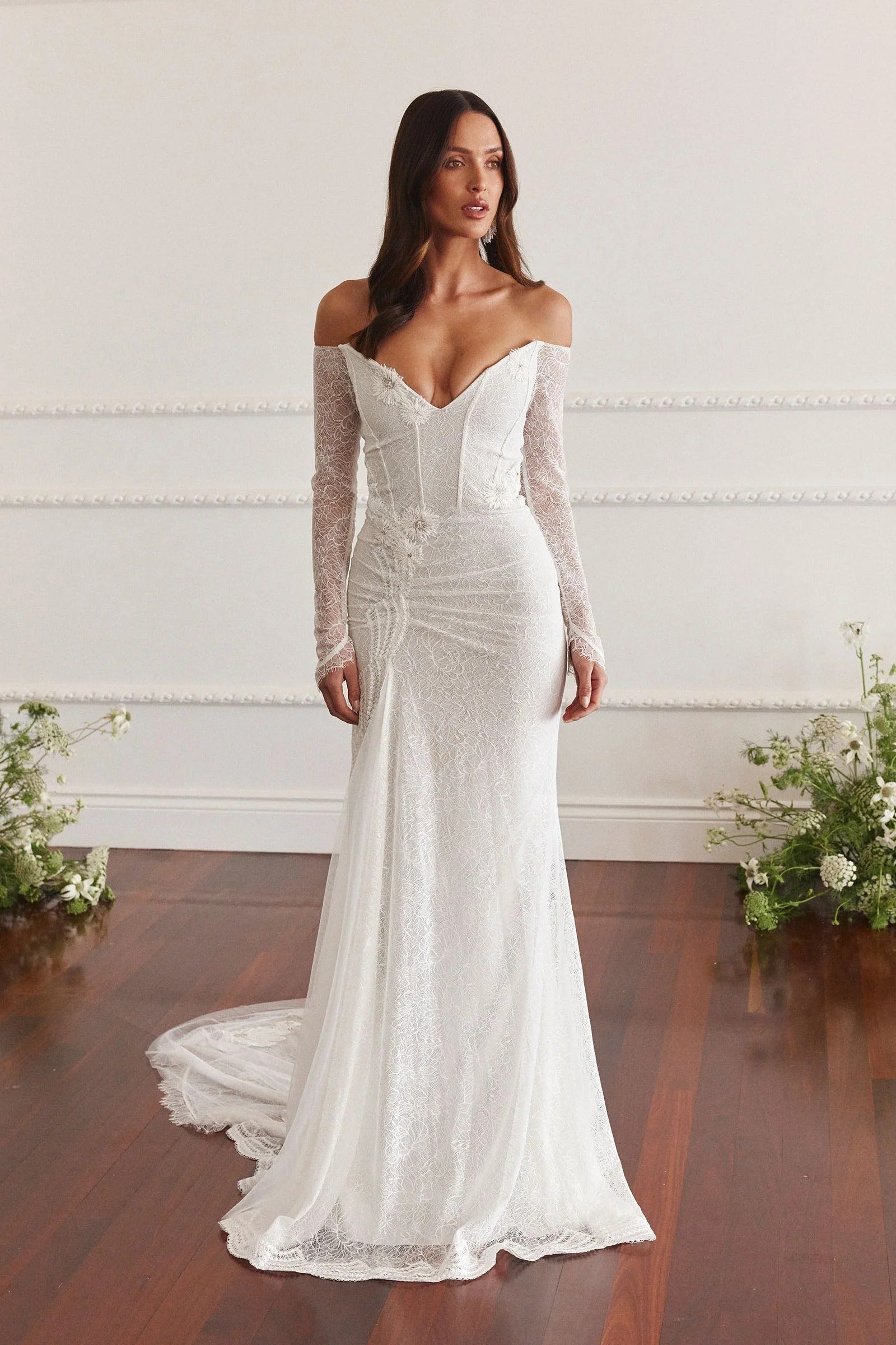 Romantic Off-the-Shoulder White Lace Mermaid Wedding Dress with Ruched Bodice and Floral Appliqués