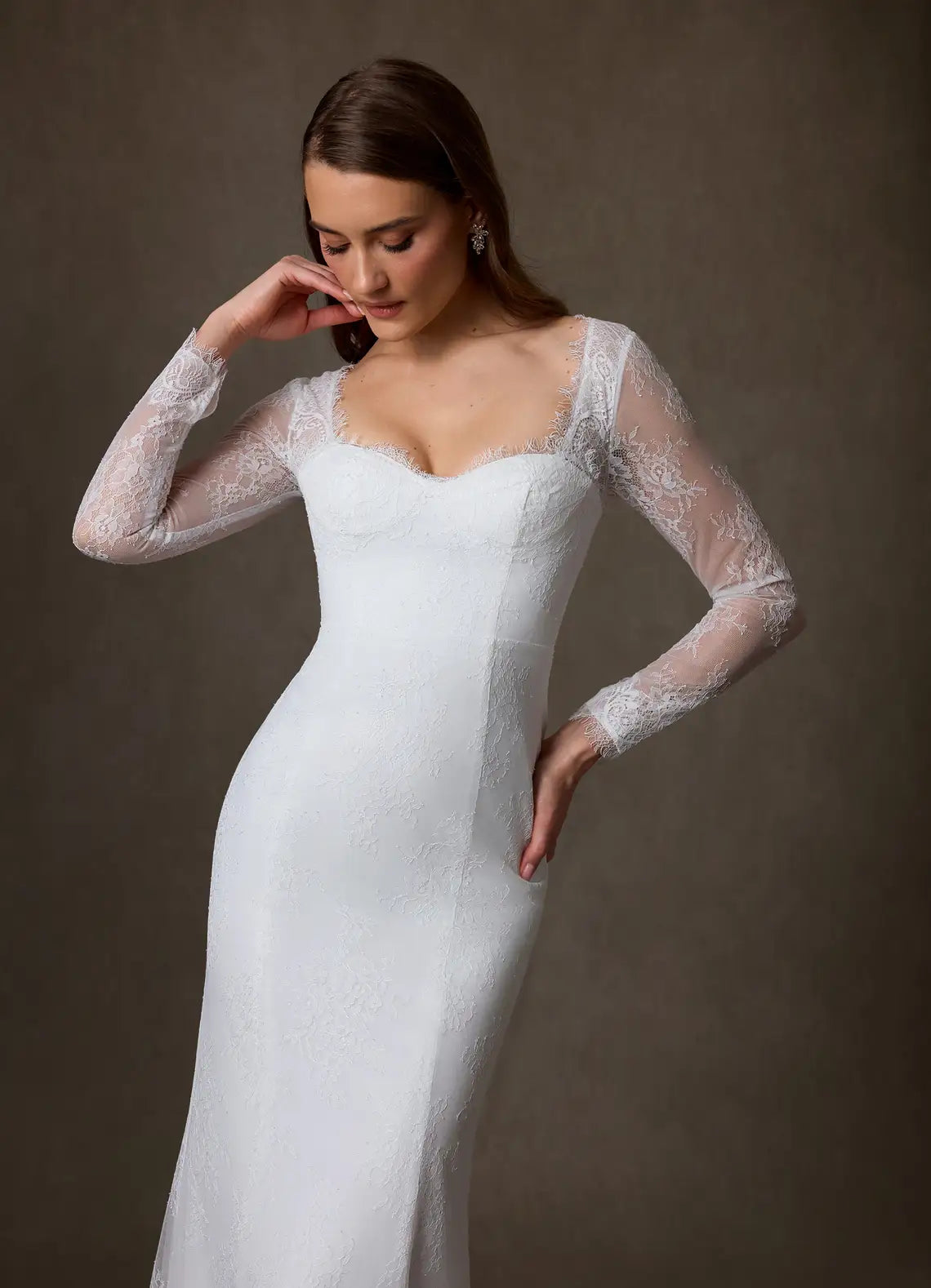 Romantic, vintage-inspired aesthetic Long Sleeve Lace Mermaid Wedding Dress with Keyhole Back