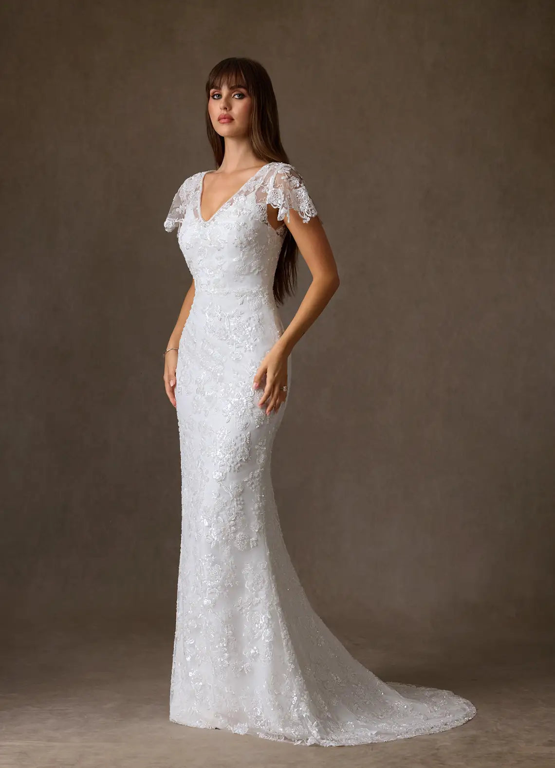 Romantic, vintage-inspired aesthetic V-Neck Lace Mermaid Wedding Dress with Sheer Flutter Sleeves
