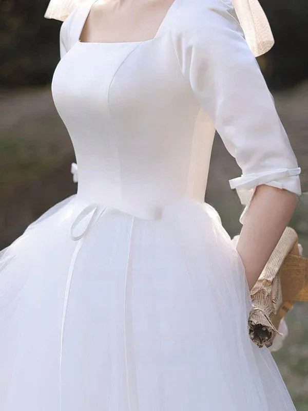 Satin waistband detail  Square Neck Satin Tulle Tea-Length Wedding Dress with Three-Quarter Sleeves