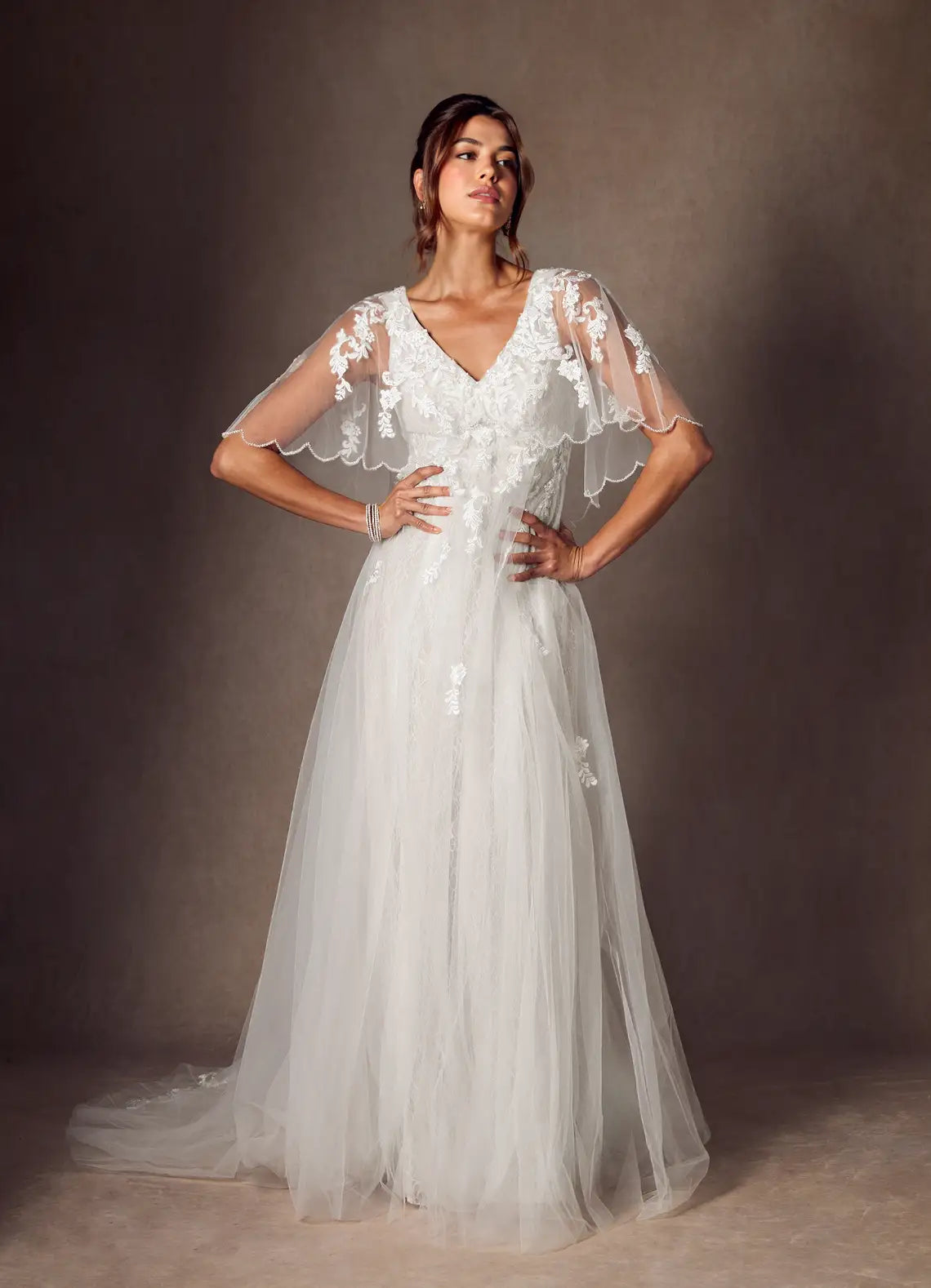 Sheer lace capelet sleeves with beaded trim Floral Lace Tulle Empire Waist Wedding Dress with Capelet Sleeves