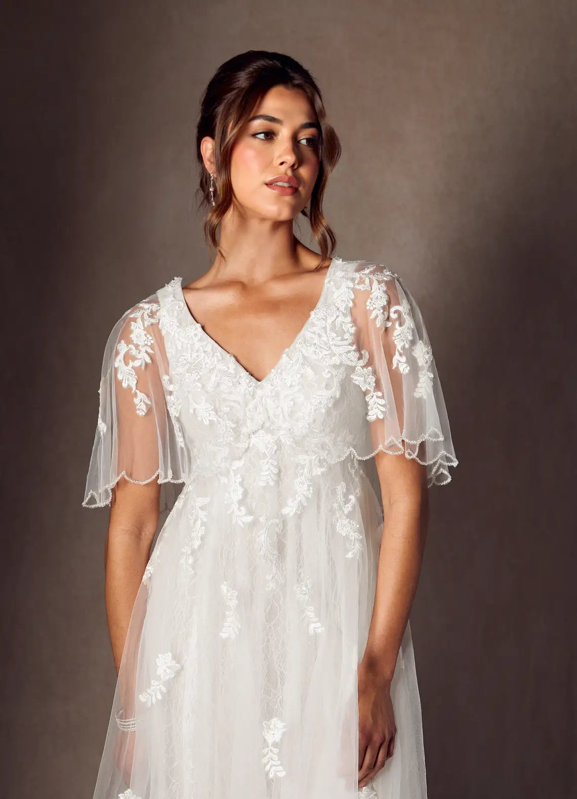 Sheer lace capelet sleeves with beaded trim Floral Lace Tulle Empire Waist Wedding Dress with Capelet Sleeves