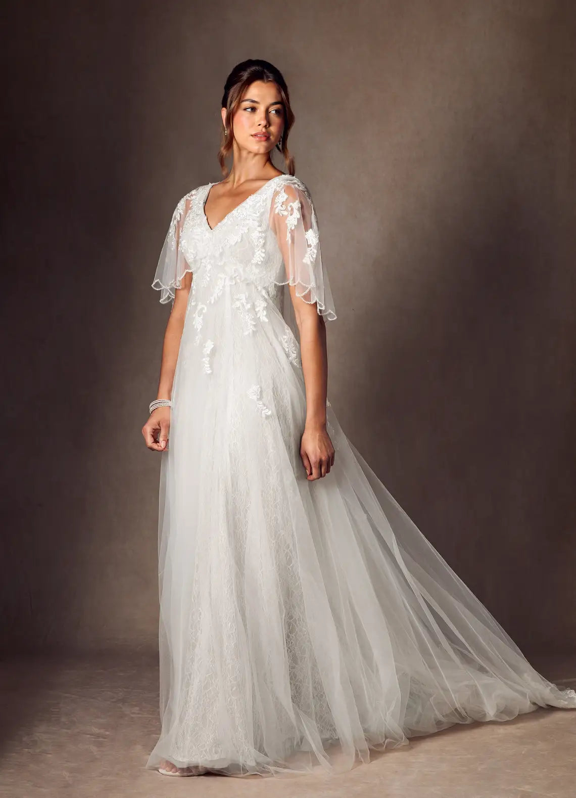 Sheer lace capelet sleeves with beaded trim Floral Lace Tulle Empire Waist Wedding Dress with Capelet Sleeves