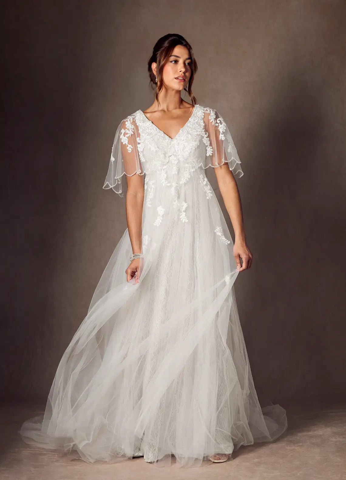 Sheer lace capelet sleeves with beaded trim Floral Lace Tulle Empire Waist Wedding Dress with Capelet Sleeves