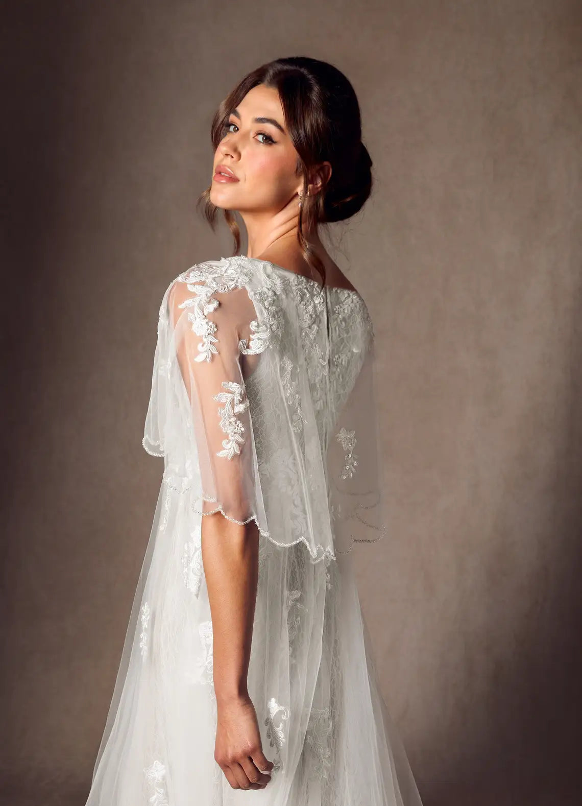Sheer lace capelet sleeves with beaded trim Floral Lace Tulle Empire Waist Wedding Dress with Capelet Sleeves