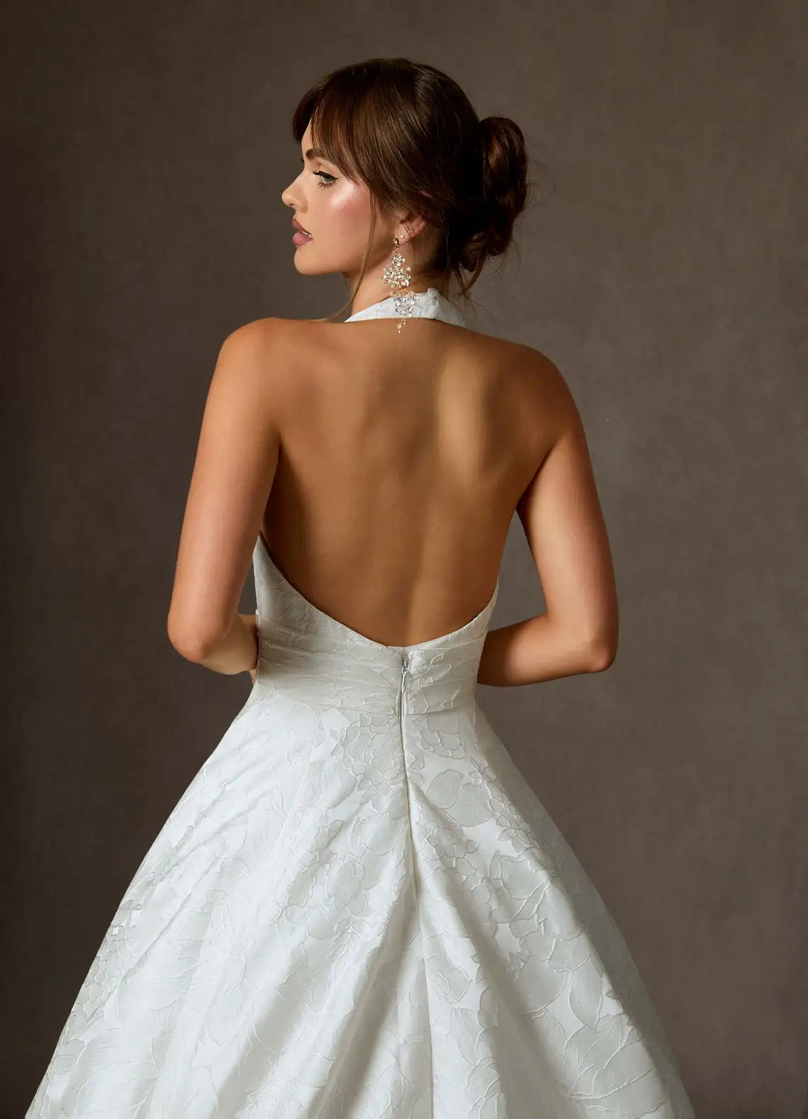 Structured bodice with defined waistband Halter Neck Floral Jacquard Ball Gown Wedding Dress with Pockets