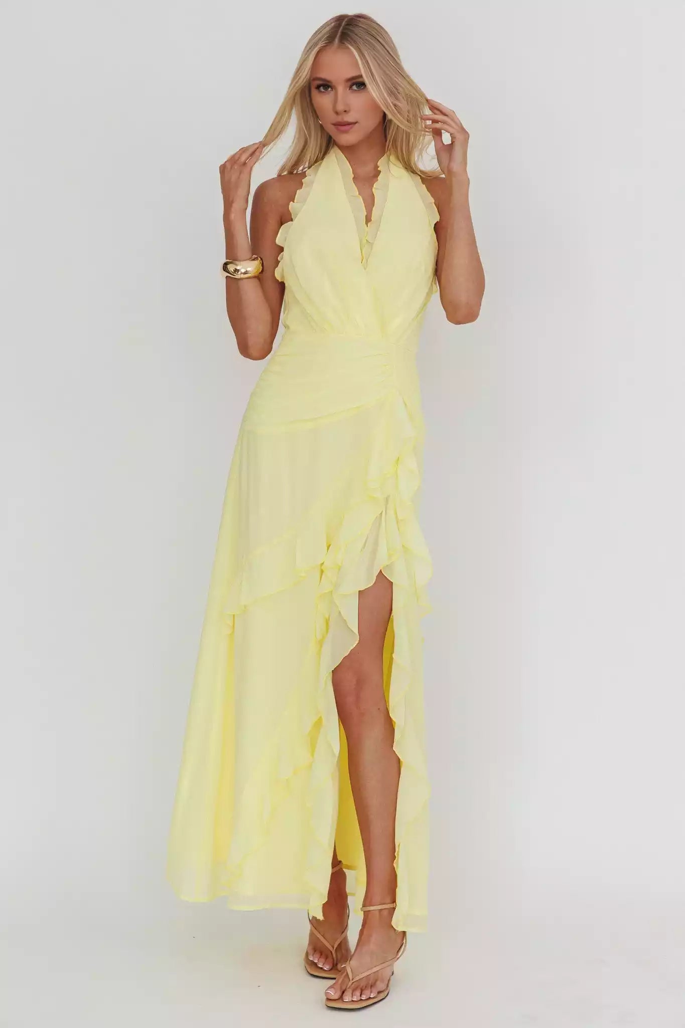 Stunning lining with backless ruffle details, front slit and back with zipper Prom Dresses