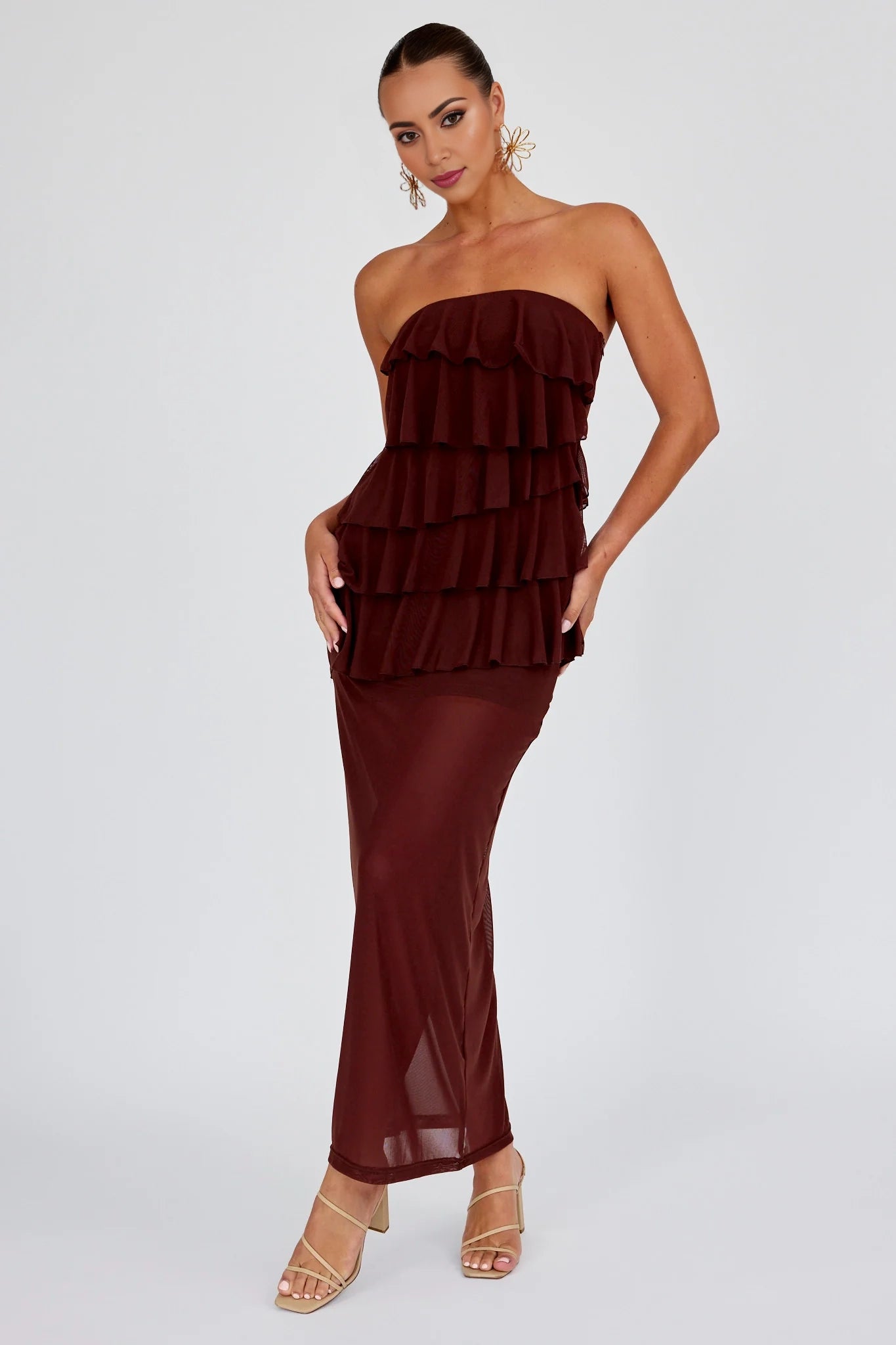 Stunning strapless mesh covering layered ruffled edges, side slits, and side zippers Homecoming Dresses
