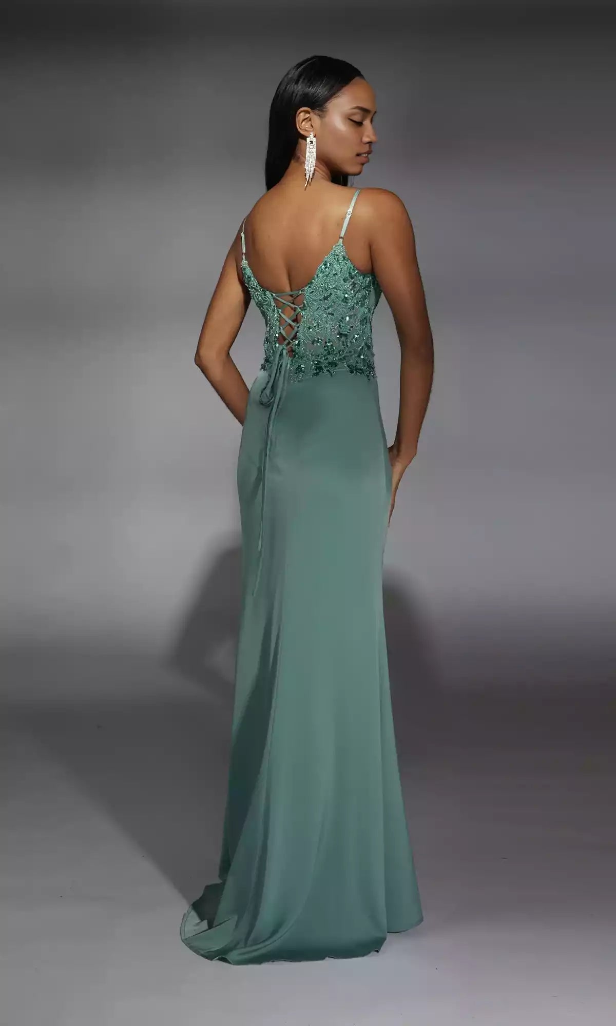 The charming beaded tight corset with back straps, pleats, and side slits is sure to amaze the audience with Prom Dresses